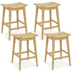 four wooden stools with wicker seats on each side and one foot in the middle