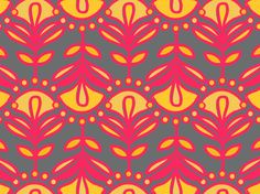 an orange and red flower pattern on a gray background with yellow circles in the center