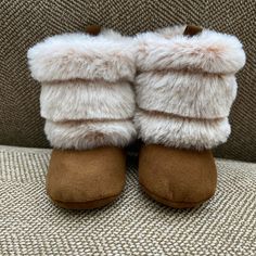 Cute Little Winter Booties To Keep Your Little Warm And Stylish! Super Soft Faux Fur And Faux Suede Boot Are Perfect For Cold Weather Outings. Easy On And Off With Velcro Closure For Snug Fit. Size 3-6 Months. Never Worn. Winter Booties With Soft Sole And Closed Toe, Cream Round Toe Winter Booties, Comfortable Soft Booties For Playtime, Winter Beige Closed Toe Booties, Beige Closed Toe Winter Booties, Winter Playtime Booties With Soft Sole, Comfortable Soft Booties With Round Toe, Comfortable Round Toe Booties For Playtime, Comfortable Soft Round Toe Booties