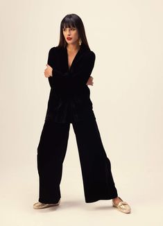 Introducing a sophisticated solid black jacket & pants co-ord set, meticulously crafted in luxurious silk velvet. This ensemble exudes timeless elegance and versatility, perfect for any occasion. Elevate your wardrobe with this chic combination, designed to make a statement with effortless style. Chic Black Velvet Outerwear, Chic Black Velvet Blazer, Luxury Long Sleeve Fall Pantsuit, Luxury Evening Pantsuit For Fall, Luxury Long Sleeve Pantsuit For Fall, Luxury Pantsuit For Night Out, Elegant Black Sets With Straight Pants, Chic Velvet Blazer For Night Out, Chic Velvet Formal Pants