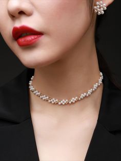 This stunning piece features a seamless fusion of delicate gold beads, creating a mesmerizing interlocking pattern. Crafted with precision and attention to detail, this choker necklace exudes elegance and sophistication, adding a touch of luxury to any ensemble. Elevate your look with this versatile accessory, perfect for both casual and formal occasions. Metal: 14K Gold Filled Gemstone: Freshwater Pearl Length: 350mm(Includes extension chain 50mm) Width: 8mm(including metal parts) Elegant White Chain Necklace With Round Beads, Elegant White Round Beads Chain Necklace, Elegant Beaded Necklaces For Party, Elegant White Beaded Chain Necklace, Gold Pearl Choker With Clavicle Chain, Gold Pearl Clavicle Chain Choker, Elegant Round Beads Chain Necklace For Parties, Luxury Pearl Choker Necklace, Elegant Pearl Chain Choker For Party