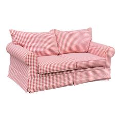 a red and white gingham couch with two pillows on the armrests