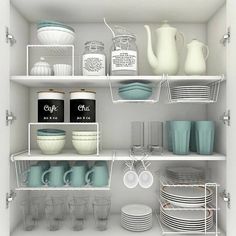 the shelves are filled with dishes and cups