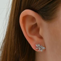 Mixed shape diamond cluster earrings are known for their contemporary yet elegant aesthetic. They make for a beautiful bridal accessory or can be worn for a chic occasion. Available in 14K White Gold Diamond weight = 1.66 carats Luxury Dazzling Cluster Earrings With Halo Setting, Luxury Diamond White Cluster Earrings With Halo Setting, Luxury Elegant Diamond Cut Cluster Earrings, Luxury Halo Cluster Jewelry, Luxury White Gold Cluster Earrings With Sparkling Stones, Luxury White Gold Gemstone Cluster Earrings, Luxury Fusion Earrings With Diamond Accents, Luxury Classic Cluster Earrings, Luxury Gia Certified White Cluster Earrings