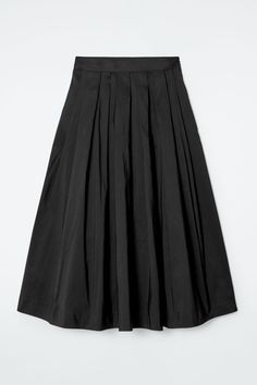 Offered in classic black, this minimal midi skirt is shaped with irregular pleats that flow into a voluminous A-line silhouette. It's designed with a zip closure and subtly concealed side pockets. Relaxed fitZip closureA better alternative to conventional polyester, recycled polyester is made from pre‐ and post‐consumer waste  Shell: 100% Recycled polyester. Excluding trims / Machine wash Back length of size 6 is 30.51" / Model wears a size 6 Black Long Pleated Skirt, Csm Fashion, White Skater Skirt, Long Pleated Skirt, Spring Skirt, Pleated Long Skirt, Black Maxi Skirt, Black Pleated Skirt, Fashion Portfolio