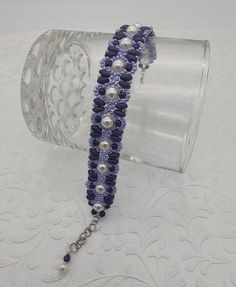 Purple Beaded Chain Bracelets With Round Beads, Purple Beaded Chain Bracelet With Round Beads, Purple Beaded Chain Bracelet As Gift, Adjustable Purple Beaded Bracelet With Beaded Chain, Adjustable Purple Beaded Chain Bracelets, Adjustable Purple Beaded Chain Bracelet, Elegant Beaded Lavender Bracelets, Elegant Lavender Beaded Bracelet, Purple Beaded Oval Jewelry