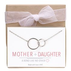 Mother Daughter Necklace, Mom Gift, Mother Daughter Gift, Interlock Circle Necklace Includes: Each necklace comes with a gift box & ribbon at no extra cost! Ready for gifting! MATERIALS - Color options: .925 Sterling Silver, Gold Vermeil, Rose Gold Vermeil - HYPOALLERGENIC, LEAD + NICKEL FREE - Made in New York City MEASUREMENTS - Pendant Height 5/8in (1.6cm) x Width 7/8in (2.2cm) - Adjustable Chain lengths: 16-18in (40-45.7cm) OR 18-20in (46-51cm) To see more Gifts for mom: https://www.etsy Mother's Day Gift Wrapped Necklace, Mother's Day Birthday Gift Wrapped Necklace, Mother's Day Gift-wrapped Necklaces, Gift-wrapped Necklace For Birthday On Mother's Day, Mother's Day Jewelry With Gift Packaging, Silver Jewelry With Message Card For Birthday, Mother's Day Wedding Necklace With Gift Box, Mother's Day Gift Necklace With Message Card, Mother's Day Anniversary Gift Necklace With Message Card