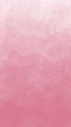 a pink and white background with watercolor stains