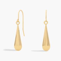 These classic 14k yellow gold teardrop earrings are perfect for everyday wear or any special occasion. Elegant Polished Teardrop Earrings For Formal Occasions, Elegant Polished Teardrop Earrings For Formal Events, Elegant Teardrop Earrings For Anniversary With Polished Finish, Elegant Teardrop Earrings For Anniversary, Timeless Teardrop Earrings With Polished Finish, Timeless Teardrop Polished Earrings, Elegant Long Drop Teardrop Earrings With Polished Finish, Elegant Polished Teardrop Drop Earrings, Classic Pear-shaped Gold Earrings