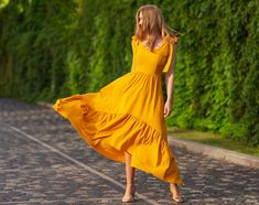 Yellow Maxi Dress For Garden Party, Yellow Long Dress For Summer, Long Yellow Summer Dress, Yellow Bohemian Floor-length Maxi Dress, Flowy Yellow Maxi Dress For Summer, Yellow Flowy Maxi Sundress, Yellow Flowy Summer Maxi Dress, Yellow Flowy Maxi Length Dress, Flowy Yellow Maxi Dress Floor-length