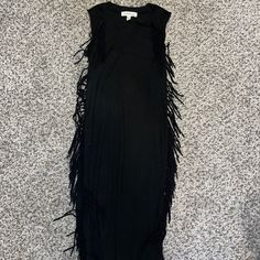 Soft Material Never Worn Black Maxi Dress With Fringe For Spring, Spring Black Maxi Dress With Fringe, Sleeveless Fringe Maxi Dress For Night Out, Black Fringe Maxi Dress For Spring, Black Sleeveless Dress With Tassels, Sleeveless Black Dress With Tassels, Black Fringe Maxi Dress For Evening, Black Sleeveless Dresses With Tassels, Black Summer Dress With Fringe