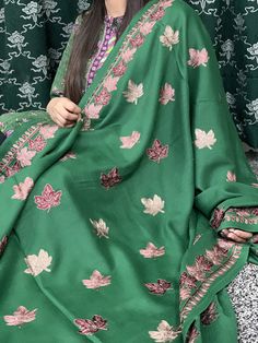 Green multicoloured kashmiri pashmina shawl is a statement piece with your winter outfits. Pure wool shawl. Embroidered kashmiri pashmina shawl. Beautiful winter accessory to pair with your statement dresses. Soft and warm beautiful winter shawl. Buy this for your self or give it to the ones you love ❤️  Length: 93 inches Width: 44.5 inches This item is dry clean only. Delivery 1-3 working days to UK 3-5 working days to Europe  And 6-7 working days to US and Other countries. Green Shawl, Statement Dresses, Embroidered Shawl, Kashmiri Shawls, Floral Shawl, Winter Shawl, Statement Dress, Wool Shawl, Pashmina Shawl