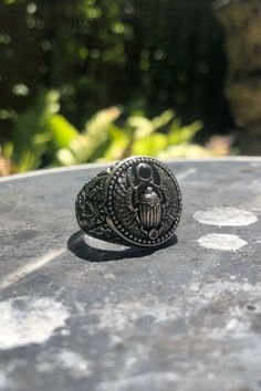 Handcrafted scarab w/ onyx stone sterling silver ring. Guaranteed 925 sterling silver with finest standards. Best fit for both women and men from ring size 6-13 US. We are now running a 10-20% sale on our… More Oxidized Sterling Silver Signet Ring, Antique Sterling Silver Adjustable Signet Ring, Sterling Silver Signet Ring With Oxidized Finish, Silver Symbolic Gemstone Rings, Symbolic Silver Gemstone Rings, Symbolic Silver Rings With Gemstone, Adjustable Silver Signet Ring With Gemstone, Collectible Oxidized Finish Signet Ring, Silver Engraved Ring With Oxidized Finish