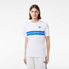 Go for maximum Lacoste style in this heavy jersey tee. Inspired by styles from our archives, featuring an XL print for a vintage feel. Featuring a modern, comfortable cut with dropped shoulders. White Jersey T-shirt With Logo Print, White Relaxed Fit T-shirt With Three Stripes, Sporty Cotton Jersey T-shirt With Logo Print, White Cotton Jersey T-shirt For Streetwear, White Logo Print Cotton Jersey Top, White Cotton Jersey Tops With Logo Print, White Cotton Jersey Top With Logo Print, White Cotton Jersey Top For Streetwear, Cotton Crew Neck Tops With Three Stripes Branding