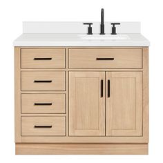 a bathroom vanity with two sinks and drawers