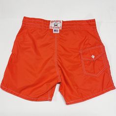 Vtg Birdwell Beach Britches Men's Size 30-31 Board Shorts Bright Red Orange Usa. Bright Red/Orange Color! Size Tag Is Washed But Measurements Would Indicate The Size Would Have Been Around 30-31 As Shown Tied In The Photo. Above The Knee, High Waisted Style, No Stretch In The Waist. Measurements Below To Ensure Proper Fit! Weighs: 4.7oz Measurements, Laying Flat: Waist Width, Edge To Edge: 15.5” Inseam: 5” Outseam (Side Length Top To Bottom): 15.5” Rise: 12” Red Bottoms With Pockets For Beach Season, Retro Vacation Bottoms With Pockets, Retro Bottoms With Pockets For Vacation, Red Vacation Bottoms With Pockets, Red Bottoms With Pockets For Vacation, Summer Orange Shorts With Pockets, Orange Summer Shorts With Pockets, Casual Orange Swim Trunks Short Length, Red Swim Trunks With Pockets For Swimming