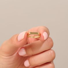 Delve into the realm of vintage glamour with our 14k Solid Gold Vintage Pinky Ring. This stunning piece is a perfect blend of timeless elegance and modern sophistication. The ring features a flat signet design, which is both classic and versatile, making it a wonderful addition to any jewelry collection. Ring Details ❥ 14k Solid Gold ( also in 10k,18k) ❥ Gold Color Options; Solid Yellow Gold, White Gold, Rose Gold ❥ Band Width: 2.16 mm ❥ Top Width: 3.48x12.12 mm ❥ Thickness: 1.55 mm ❥ Ready to S Minimalist Gold Emerald Cut Jewelry, Dainty Emerald Cut Gold Rings, Minimalist Gold Emerald-cut Jewelry, Minimalist Emerald Cut Gold Jewelry, Minimalist Gold Emerald Stackable Ring, Gold Emerald Ring With Vs Clarity In 14k Gold, Elegant Adjustable Gold Emerald Ring, Dainty Gold Emerald Cut Ring, Modern Gold Promise Birthstone Ring