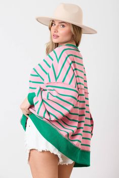 Get cozy and stylish with our Striped Loose Fit Sweatshirt! This oversized sweatshirt features a fun pink and green striped design and is made of waffle knit material for extra comfort. With a high low hem and button closures, it's the perfect combination of fashion and function. 😍 - Fits very oversized - Round neckline - Long sleeves -Button-down closure - Raw seam - High-low hem -95% Polyester 5% Spandex Casual Spring Sweater With Striped Hem, Trendy Oversized Striped Sweater, Oversized Striped Cotton Sweater, Pink Cotton Top With Contrast Stripes, Striped Crew Neck Sweatshirt For Spring, Spring Crew Neck Sweater With Striped Cuffs, Relaxed Fit Sweater With Contrast Stripes For Spring, Pink Relaxed Fit Sweatshirt For Layering, Oversized Top With Striped Hem