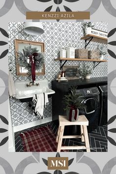 a black and white tiled bathroom with a washer and dryer in the corner