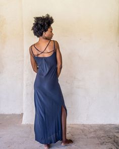 The IDIS Long slip dress is made from a light weight woven rayon. Designed with a scoop neck line and double strapes that drape nicely down the back, side splits to just below the knee and cut on the bias. These features create a dress that moves with you. Bringing you comfort and movability while maintaining a simple elegance. Our long slip looks great teamed with the Kimono Crop from the idis range for a layered effect. SIZE GUIDE XS: bust 76-82 cm | waist 64-70 cm | hips 78-84 cm S: bust 82-8 Fitted Summer Slip Dress For Beach, Fitted Summer Slip Dress For The Beach, Summer Maxi Slip Dress With Adjustable Straps, Brunch Maxi Slip Dress With Adjustable Straps, Maxi Slip Dress With Adjustable Straps For Brunch, Maxi Length Slip Dress With Adjustable Straps For Brunch, Fitted Bohemian Maxi Dress With Adjustable Straps, Beach Midi Slip Dress With Adjustable Straps, Rayon Maxi Dress With Spaghetti Straps For Beach