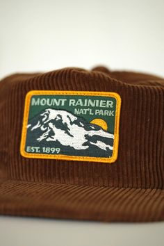 Our amazing vintage Mount Rainier National Park vintage patch is now on the most epic corduroy cap! This corduroy is 8-wale* corduroy and feels sooo nice in hand. *Fun fact: corduroy comes in varying thicknesses, which are determined by the width of each individual cord, also known as a wale. (Wale is a very old word deriving from the word for the raised ridges in a plowed field) Every purchase helps support the National Parks via organizations like WNPF.org Cap application finished in the PNW V Brown Corduroy Hat For Outdoor, Vintage Adjustable Corduroy Trucker Hat, Retro Corduroy Snapback Hat, Retro Corduroy 5-panel Hat, Vintage Brown Hat With Logo Patch, Vintage Corduroy Cap, Vintage Corduroy Snapback Trucker Hat, Vintage Corduroy Trucker Hat, Vintage Trucker Hat For Outdoor Activities