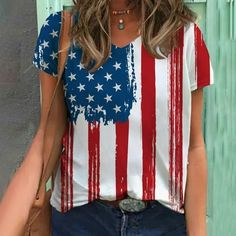 Welcome to our store!  The Women's 4th of July Top is the perfect way to celebrate Independence Day in style. Made from high-quality materials, this top is both comfortable and stylish, making it the perfect addition to any wardrobe. Featuring a classic red, white, and blue color scheme, this top is perfect for any patriotic occasion. With a flattering fit and a stylish design, this top is sure to turn heads wherever you go.  The Women's 4th of July Top is a versatile piece that can be dressed u Blue T-shirt With American Flag Print For Spring, White Tops With American Flag Print For Beach, American Flag Print Cotton Top For Beach, White American Flag Print Tops For Beach, White American Flag Print Top For Beach, White American Flag Print Top For The Beach, Casual American Flag Print Top For Vacation, American Flag Print Summer Beach Top, Multicolor Short Sleeve Shirt For 4th Of July