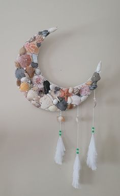 the moon is made out of shells and tassels