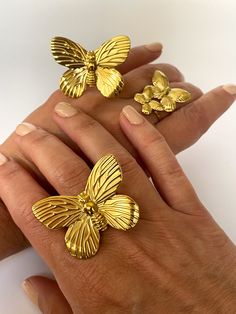 Elevate your style with our Mariposa Rings. Crafted from stainless steel and gold plated for a luxurious touch, these adjustable rings come in two stunning styles. Add a touch of sophistication and exclusivity to any outfit with these elegant rings.