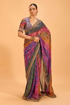 Multicolored saree with floral sequin embroidery. Paired with an embroidered blouse with tasseled sleeves. - Aza Fashions Multi Colour Saree, Multicolored Saree, Saree Gowns, Dhoti Saree, Cotton Sarees Handloom, Floral Saree, Ruffle Saree, Embroidered Saree, Sequin Embroidery