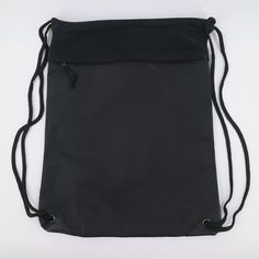 a black bag sitting on top of a white table