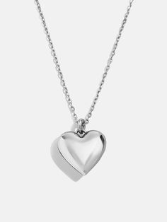 Design a special memento to represent those closest to your heart. The Puffy Heart Sterling Silver Custom Pendant Necklace features a three-dimensional heart charm with the option to add 1-4 engraved letters of your choosing. Add the initials of each of the members of your family, you and a few loved ones, or even just your own - the options are endless. Better yet, this piece is crafted with sterling silver, meaning it'll last you a lifetime. Keepsake Double Heart Necklace With Heart Charm, Keepsake Double Heart Charm Necklace, Sterling Silver Double Heart Necklace For Memorial, Sterling Silver Double Heart Necklace For Memorials, White Gold Double Heart Keepsake Necklace, White Gold Heart Necklace With Charm For Keepsake, Memorial Heart Charm Open Heart Necklace, Engraved Double Heart White Gold Necklace, Memorial Open Heart Necklace With Heart Charm