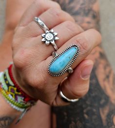 Adjustable Turquoise Ring In Sterling Silver For Healing, Adjustable Blue Larimar Ring, Adjustable Turquoise Jewelry With Large Stone, Adjustable Turquoise Bohemian Crystal Ring, Bohemian Stackable Blue Turquoise Ring, Bohemian Oval Wire Wrapped Jewelry, Bohemian Blue Stackable Turquoise Ring, Handmade Turquoise Larimar Jewelry, Bohemian Silver Larimar Jewelry