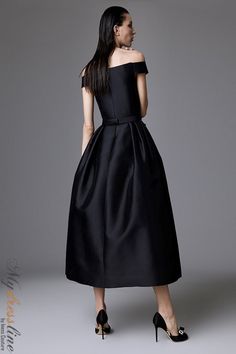 Looking for a dress that will make you feel like a princess? Look no further than the Audrey+Brooks 6128 Off-the-shoulder midi dress. This gorgeous dress features an full skirt silhouette with crinoline, hidden back zipper, and satin-lined bodice. The belt with bow detail adds the perfect finishing touch. Made from 51% silk and 49% wool, this dress is sure to turn heads. Fitted A-line Off Shoulder Dress For Gala, Boat Neck Dress With Fitted Bodice For Gala, Boat Neck Gala Dress With Fitted Bodice, Elegant Evening Dress With Fitted Bodice And Boat Neck, Silk Evening Dress With Pleated Details, Elegant Sleeveless Off Shoulder Dress For Gala, Elegant Sleeveless Off Shoulder Dress With Fitted Bodice, Elegant A-line Off Shoulder Cocktail Dress, Elegant Sleeveless Off-shoulder Dress With Fitted Bodice