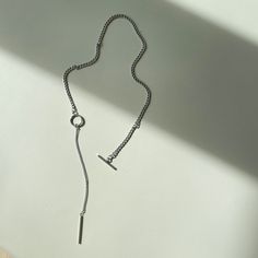 Elevate your style with our **O Ring Necklace** - a perfect blend of minimalist design and industrial chic. Made from high-quality stainless steel, this geometric necklace features a striking O-ring pendant complemented by a sleek bar and slim chain. Ideal for women seeking a bold yet elegant accessory, this long chain necklace effortlessly combines fashion-forward aesthetics with everyday wearability. ▪️▪️▪️PRODUCT Unisex Style 316L stainless steel  Never Fade and Hypoallergenic  VISIT STORE FOR MORE PRODUCT ▪️▪️▪️ S H I P P I N G   All orders will be shipped on the next business day UNITED STATES  - USPS First-Class Mail * 4 - 14 Business Days  Tracking & Insurance included CANADA - Canada Post * 4 - 14 Business Days Tracking & Insurance included EUROPE * 6 - 14 Business Days Tracking & Minimalist Lariat Necklace With Silver Chain, Minimalist Long Chain Lariat Necklace, Minimalist Long Lariat Necklace With Chain, Minimalist Lariat Chain Necklace, Minimalist Stainless Steel Silver Chain Necklace, Minimalist Silver Chain Necklace For Everyday, Everyday Minimalist Lariat Necklace With Simple Chain, Minimalist Silver Lariat Chain, Minimalist Silver Chain Necklace With Adjustable Chain