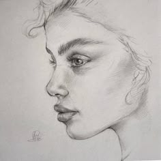 a pencil drawing of a woman's face