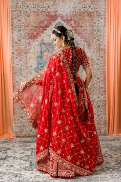 Deep Red Bridal Gotta Patti and Zardozi Lehenga Tomato Red Bridal Lehenga, Red Anarkali Sharara For Reception, Red Bollywood Anarkali Set With Traditional Drape, Red Raw Silk Anarkali Set With Dupatta, Red Chanderi Pre-draped Saree With Dupatta, Red Pre-draped Saree For Eid Wedding, Red Anarkali With Sheer Dupatta, Red Sharara With Dupatta In Chanderi, Red Cutdana Chanderi Dress