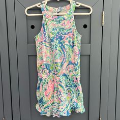 Nwot Lilly Pulitzer Seashell Print Sleeveless Romper. Like New Condition With No Markings Or Stains! Great For Summer. Playful Blue Tank Top For Spring, Blue Tank Top For Spring Playwear, Playful Sleeveless Tank Top For Vacation, Cute Blue Sleeveless Tank Top, Blue Summer Tank Top For Playwear, Pink Tank Top For Spring Playwear, Cute Multicolor Sleeveless Tank Top, Playful Tank Top For Beach, Pink Sleeveless Tank Top For Play