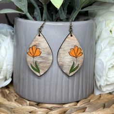 Introducing our charming Flowy Flower Dangle Earrings, a delightful accessory. Elegant and eye-catching, our earrings are adorned with a colorful array of painted accents that add a playful pop of color to your look. These pair of earrings will suit your style and preference. Laser Cut Wood Earrings, Laser Cut Wood, Wood Earrings, Light Weight Earrings, Pyrography, Color Pop, Polymer Clay, Jewelry Earrings Dangle, Etsy Earrings