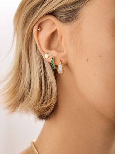 Upgrade your ear stack with some birthstone bling, courtesy of the 18K Gold Birthstone Huggie Earrings. Your signature birthstone gorgeously wraps around the gold huggie, making for an elegant, personalized accessory that’s sure to brighten up your ear stack. Crafted out of 18k gold plated sterling silver, this birthstone earring will dazzle for years.