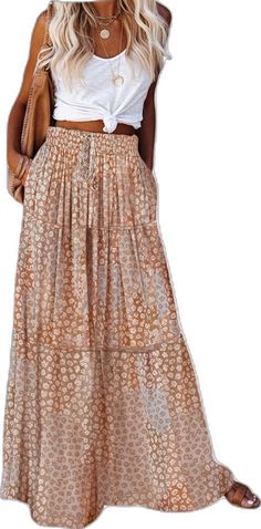 Bohemian Pleated Beach Bottoms, Summer Pleated Brown Skirt, Spring Paisley Print Flowy Maxi Skirt, Spring Flowy Maxi Skirt With Paisley Print, Bohemian Pleated Midi Skirt, Summer Bohemian Pleated Skirt, Summer Paisley Print Long Skirt, Summer Long Skirt With Paisley Print, Beige Floral Print Tiered Skirt