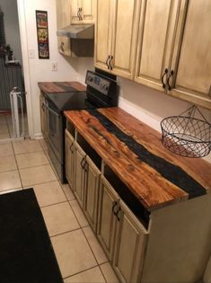 a kitchen counter made out of wood and metal