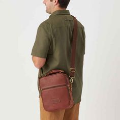 Leather Travel Bag 2.0 | Duluth Trading Company Versatile Brown Camera Bag For Daily Use, Brown Travel Shoulder Bag With Cell Phone Pocket, Brown Pouch Camera Bag For Everyday Use, Everyday Use Brown Pouch Camera Bag, Everyday Brown Pouch Camera Bag, Brown Camera Bag With Removable Pouch For On-the-go, Modern Brown Camera Bag For Everyday Use, Brown Crossbody Camera Bag For Travel, Modern Brown Camera Bag For Everyday