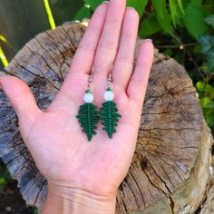 All Jewelry Components Are Lead And Nickel Free. Handmade Items. Size: Length 1.5 Inches, Drop Length 2 Inches. Experience Nature's Dance With Our Handmade Gemstone Fern Shaped Macrame Earrings. These Unique Accessories Feature Boho Botanical Elegance With Moonstones Intricately Woven Into Fern-Shaped Macrame Knots, Creating A Statement Of Artisan Earthy Foliage. Make A Statement With These Igemstone Fern Shaped Macrame Earrings, Capturing The Essence Of Earthy Botanical Elegance. If You Have An White Macrame Dangle Jewelry, Green Macrame Earrings As A Gift, Green Macrame Earrings For Gift, Black Woman Silhouette, Artisan Jewelry Handmade, Bohemian Floral, Macrame Earrings, Cowrie Shell, Beaded Dangle Earrings