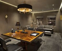 a large wooden table sitting in the middle of a room