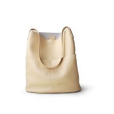 The CHLOE Bucket Bag is a stylish and convenient handbag that is perfect for everyday use. The bag is made from high-quality genuine leather and features a polyester lining that helps to protect your belongings. The interior of the bag includes a slot pocket, a zipper pocket, and a compartment for organization. The bag also comes with a shoulder strap for ease and comfort. Product Details Main Material: Genuine Leather Lining Material: Polyester Item Type: Handbags Interior: Interior Slot Pocket Chloe Bucket Bag, Black Hair Band, Leather Bucket Bag, Leather Bucket, Light Cream, Leather Bags, Best Seller, Cow Leather, Hair Band