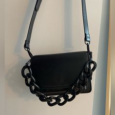 Na-Kd. Brand New. Worn Once. Perfect Condition. Black Square Bag With Chain Strap, Black Rectangular Shoulder Bag With Chain, Modern Black Shoulder Bag With Chain, Black Square Shoulder Bag With Chain Strap, Black Satchel Shoulder Bag With Chain Detail, Modern Black Shoulder Bag With Chain Strap, Everyday Black Bags With Gold Chain, Black Square Shoulder Bag With Chain, Black Crossbody Shoulder Bag With Chain Strap