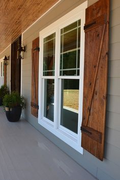 an image of a window with shutters on the side of it that reads, best 25 + gray siding ideas on pinterest crm