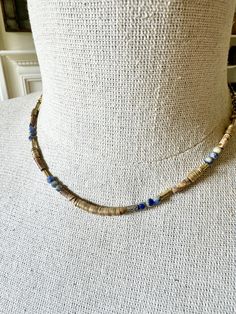 Bohemian blue handbeaded agate, jasper and heishi must! Timeless statement and layering go-to! -17” adjustable length Adjustable Hand-strung Necklaces For Layering, Adjustable Necklace For Layering, Earthy Blue Jewelry For Festivals, Adjustable Single Strand Heishi Beads Jewelry, Adjustable Single Strand Lapis Lazuli Beaded Necklace, Earthy Beaded Blue Jewelry, Blue Bohemian Heishi Beads Jewelry, Bohemian Lapis Lazuli Beaded Necklace With Adjustable Fit, Adjustable Bohemian Lapis Lazuli Beaded Necklace