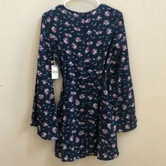 Must Have Summer Floral Outfit. Wear Unique Stuff To Stay Out Fab & Fashionable. Dresses Bell Sleeves, Floral Outfit Summer, Usa Dresses, Floral Outfit, Summer Floral, Skater Dress, Deep V Neck, Deep V, Front Open