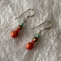 Minimalist drop earrings are perfect for the summer! Vibrant colors of pink, bronze, orange and turquoise. They are made with sterling silver and Czech glass beads. App. 1.5 in" long. Thanks for visiting our shop! Everyday Hypoallergenic Orange Jewelry, Nickel Free Orange Earrings For Everyday, Nickel-free Orange Earrings For Everyday Wear, Colorful Beaded Copper Earrings Gift, Orange Dangle Earrings Minimalist Style, Orange Minimalist Dangle Jewelry, Minimalist Orange Dangle Jewelry, Everyday Hypoallergenic Orange Earrings, Orange Faceted Beads Dangle Earrings